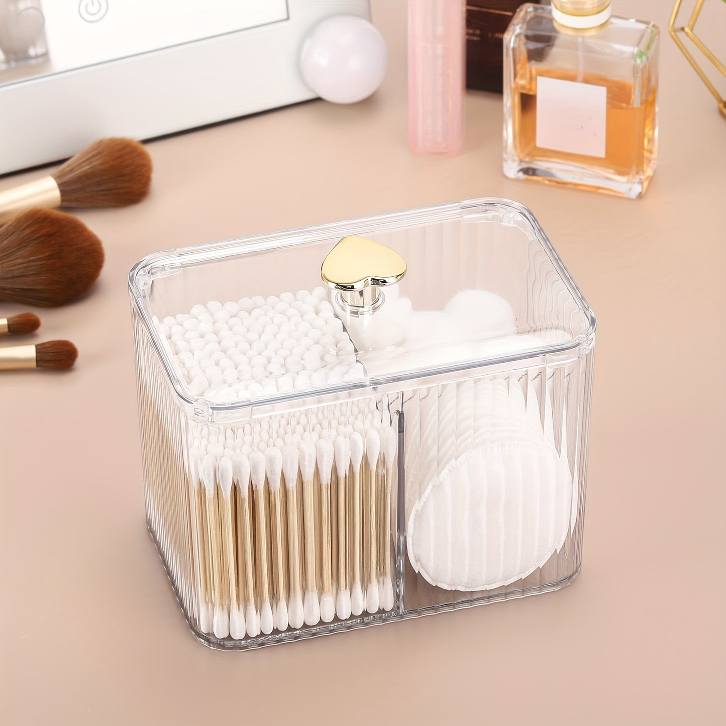 Clear plastic Qtip holder with 3 sections for cotton swabs, pads, and balls. Ideal for vanity storage, lightweight and space-saving.