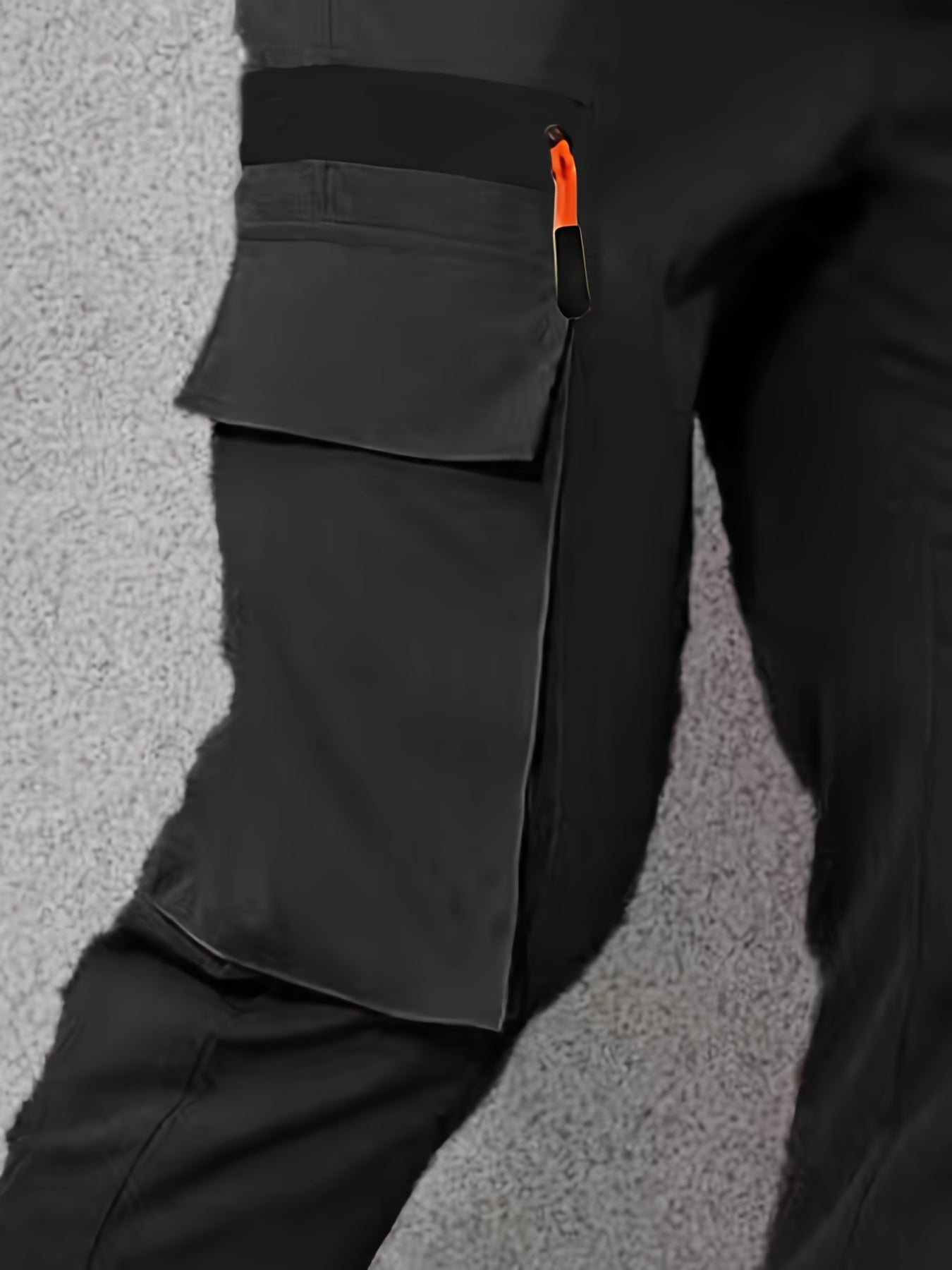 Men's casual cargo pants made of solid color polyester, feature a regular fit, multiple pockets, and straight-leg design for sports and leisure activities all year round.