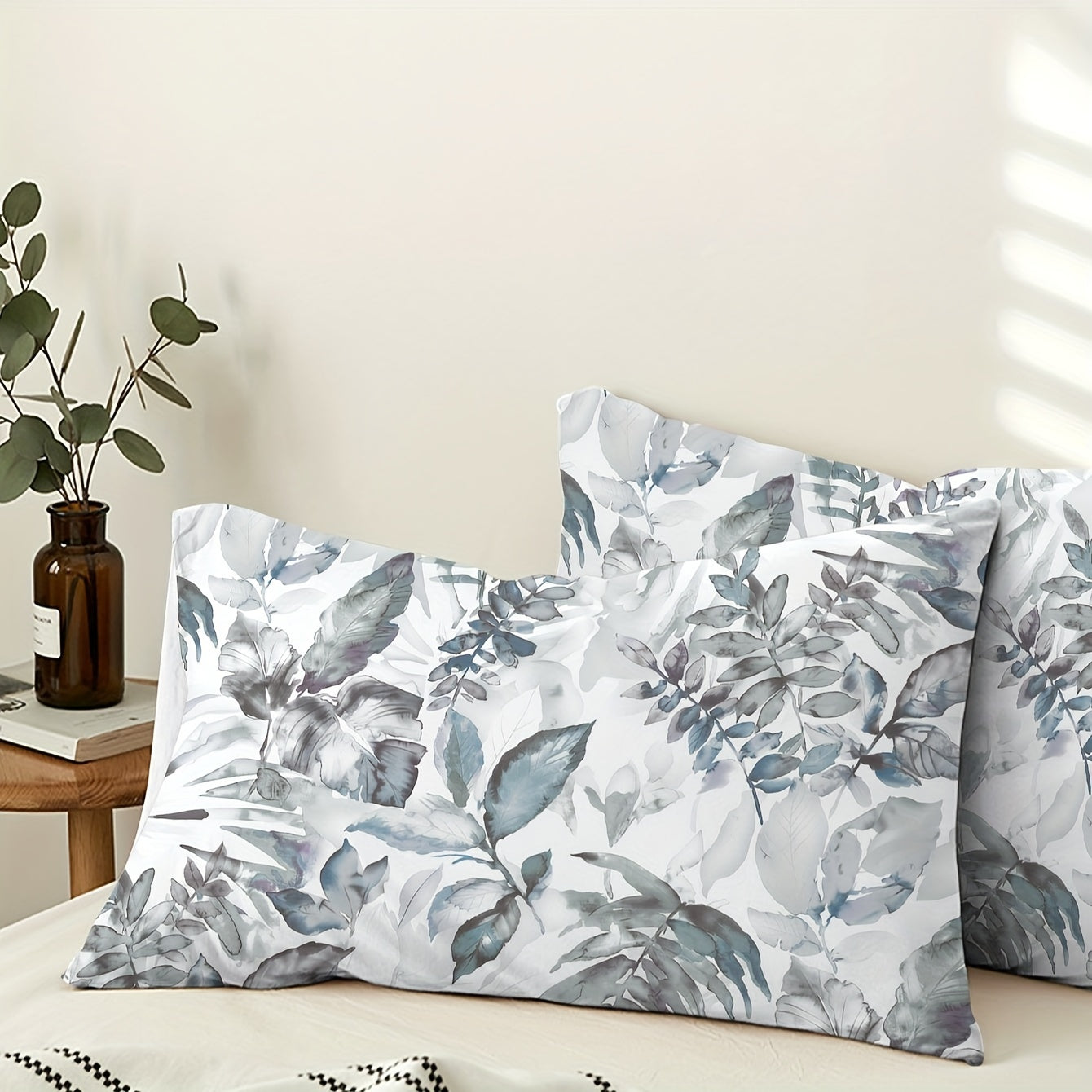 Leaf pattern brushed printed pillowcases, set of 2. Made from soft and breathable materials, perfect for enhancing the decor of your bedroom sofa or home. Pillow cores not included.