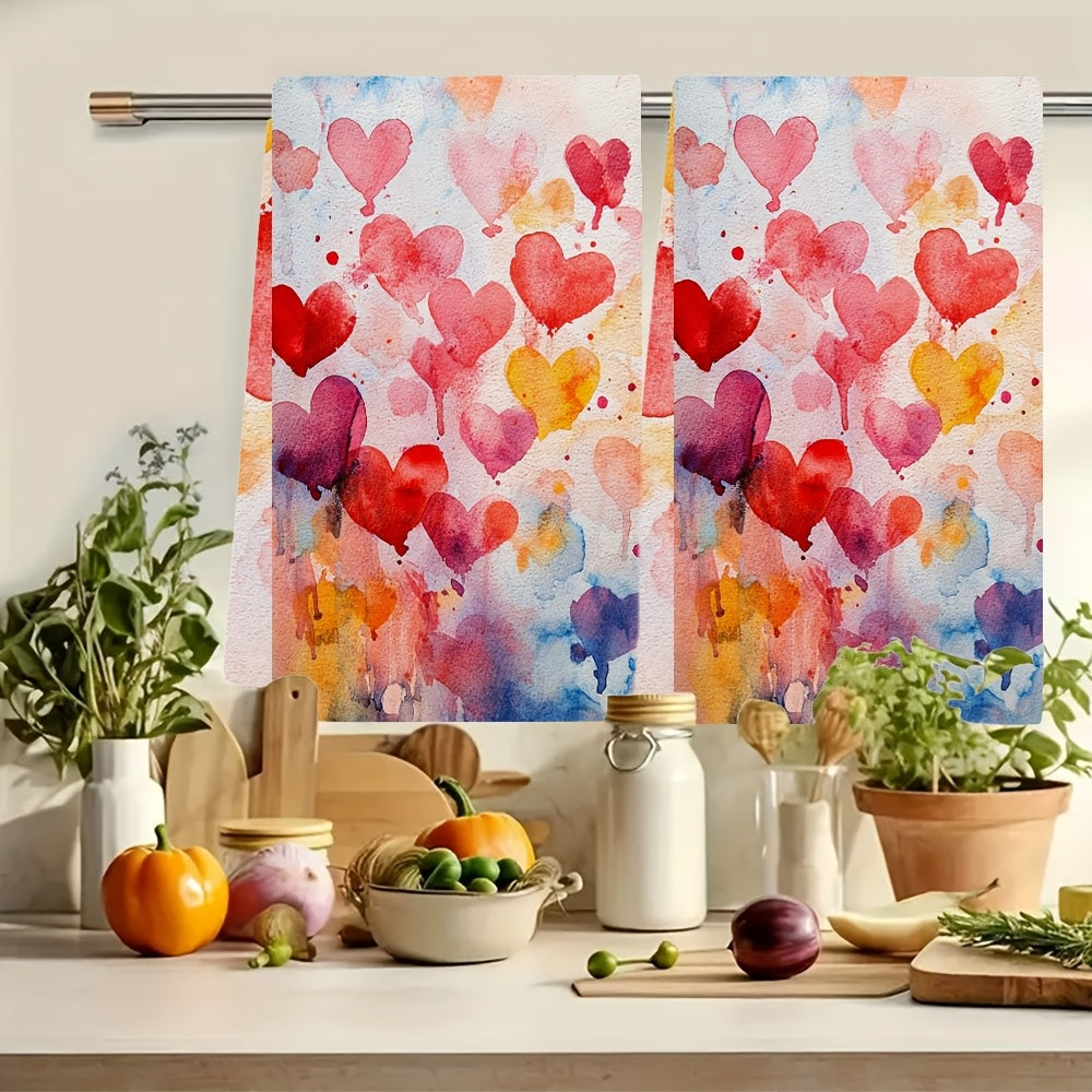 Set of 2 Ultra Soft Kitchen Towels featuring a Valentine's Day Heart Splash Design. These towels are highly absorbent, machine washable and measure 40.64x60.96 cm. They have vibrant watercolor hearts perfect for adding a festive touch to your home decor.