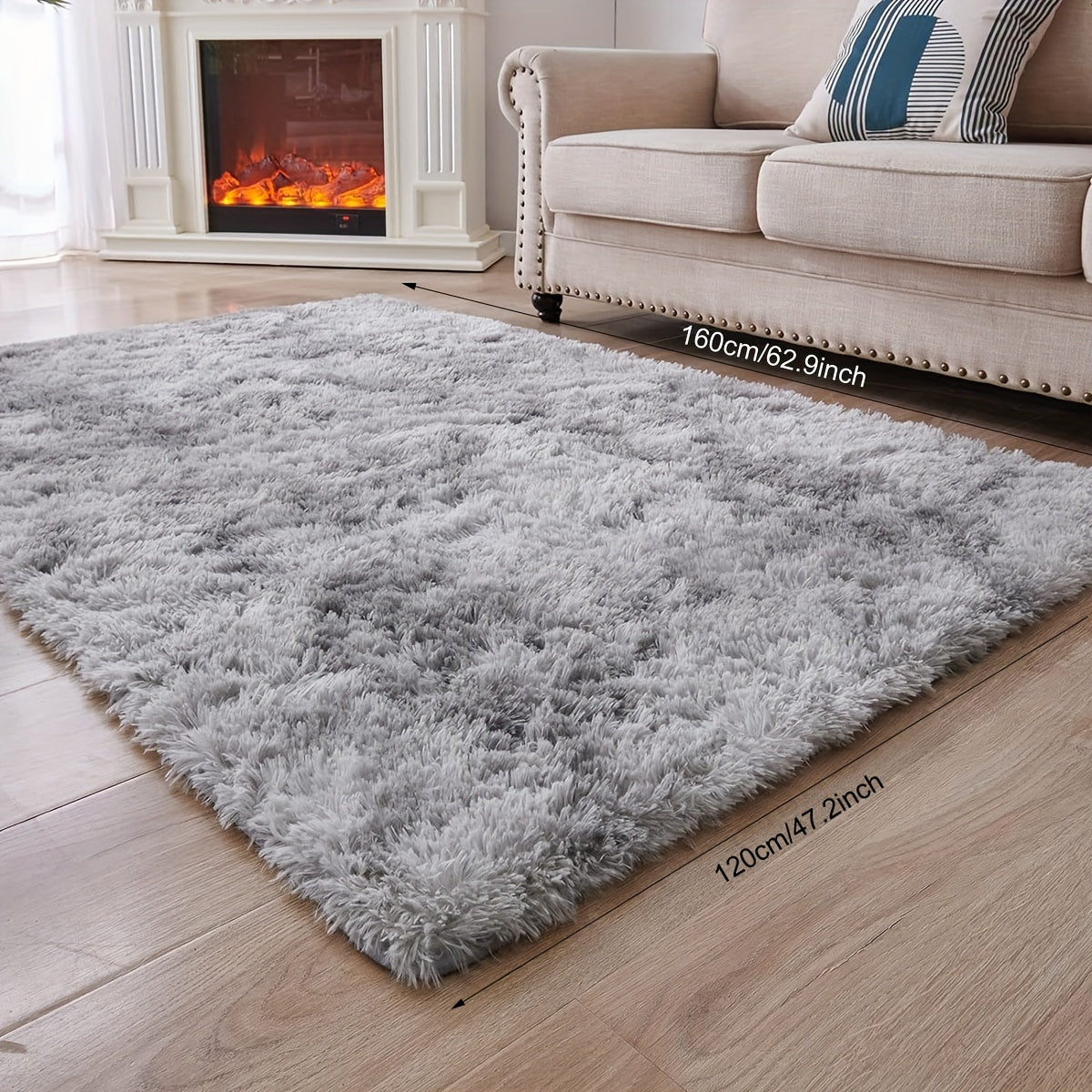 Transform your living room or bedroom with this Super Soft Shag Area Rug! Made of stain resistant and lightweight washable polyester, this indoor rug in solid gray is the perfect addition to your room decor and holiday celebrations. Get 1PC now and