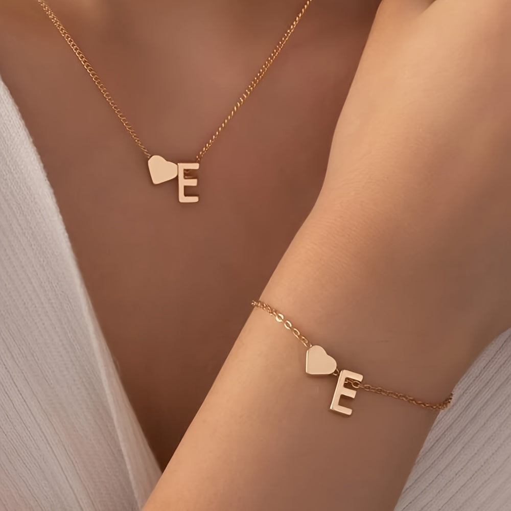 Chic two-piece set with metal heart and letter necklace and bracelet, ideal for daily wear.