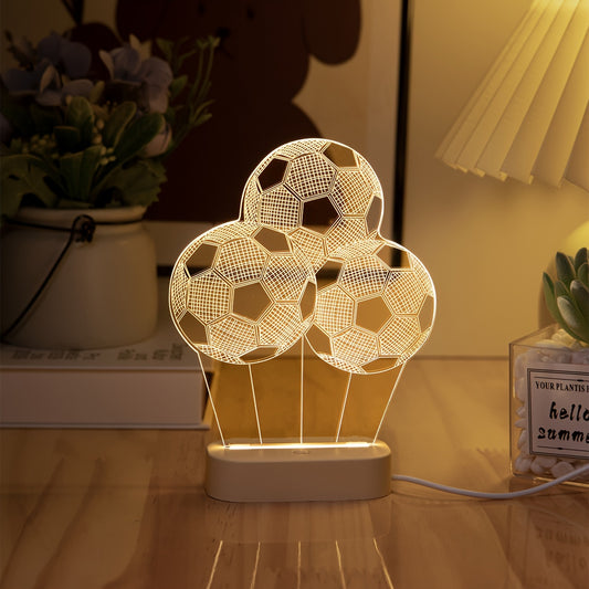 Soccer ball night light powered by USB for modern decor in living room and bedroom.