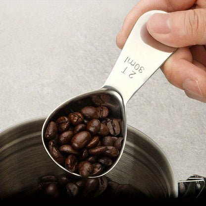 Coffee scoop made of stainless steel with measurement marks - ideal for measuring beans, powder, and baking ingredients.