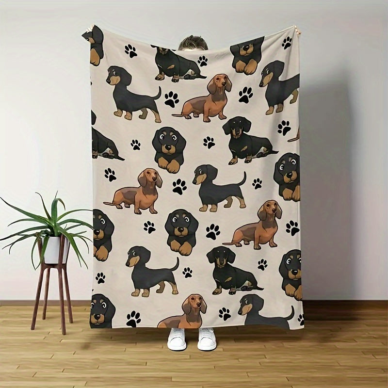 Soft and cozy Dachshund dog print fleece blanket perfect for pet lovers. This all-season throw is machine washable with a digital print design on a polyester cover and lining. Made with 200-250gsm knitted fabric in a contemporary style, this