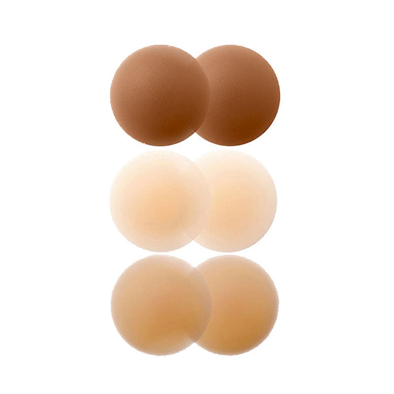 1 pair of breathable, reusable nipple covers for women, seamless and invisible, with adhesive sticky silicone and holes in beige color.