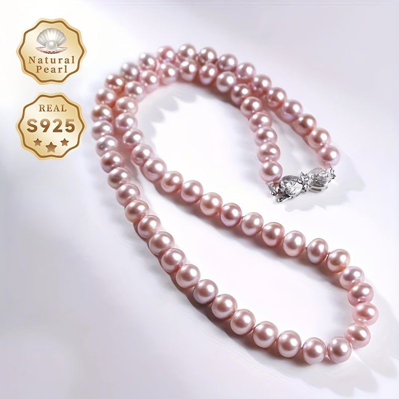 This luxurious and elegant freshwater pearl necklace is designed for women with a June birthstone. It features a S925 silver clasp and a 7-7.5mm strand of purple natural pearls. The necklace comes in a gift box and is perfect for daily wear or special