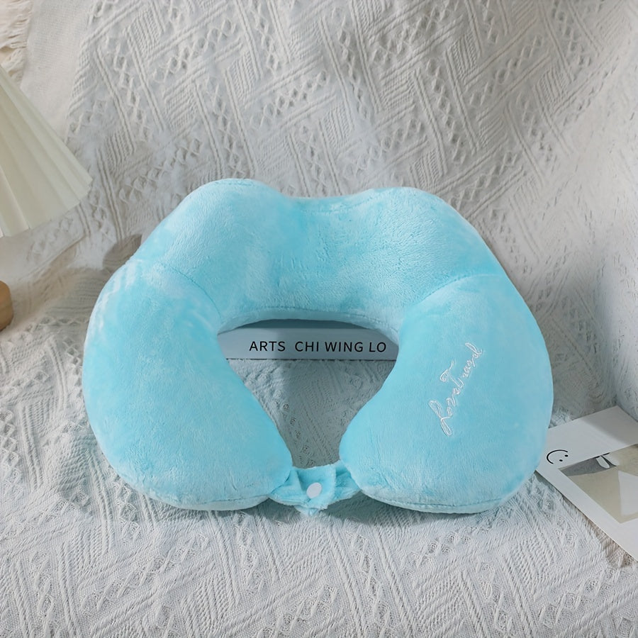 Soft and portable travel pillow in U shape, perfect for neck support on planes, trains, and cars. Ideal for a comfortable rest while traveling.