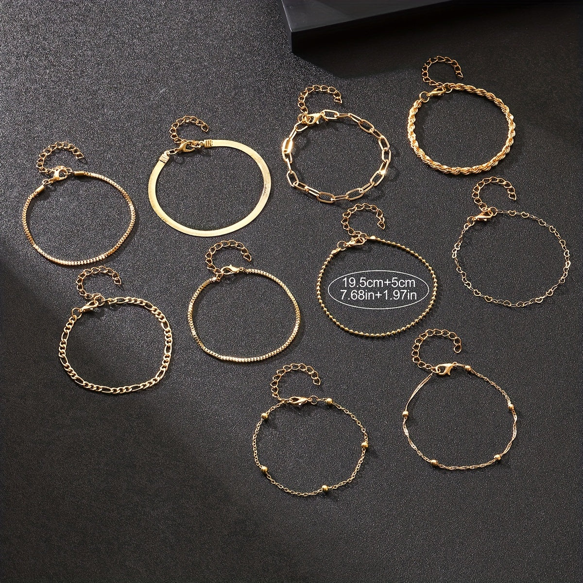 Set of 10 elegant golden bracelets for women, stylish and versatile for daily wear or vacation, great gift idea.