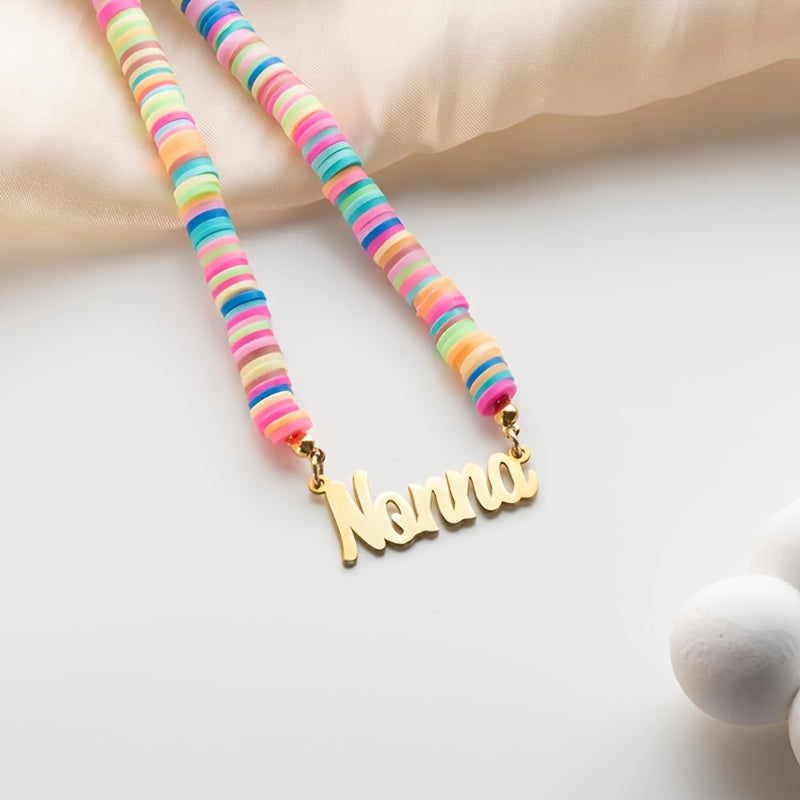 Customized Rainbow Name Necklace plated in 18K gold, featuring polymer clay beads. This accessory is both elegant and adorable, perfect for wearing all year round at any occasion. A great gift idea for Christmas and New Year's.