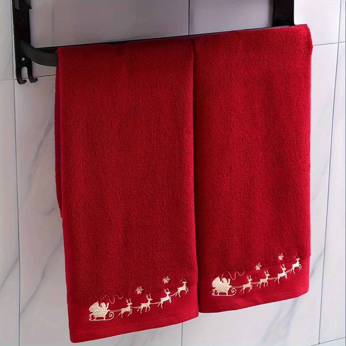 2 QIBHI Vintage Christmas Reindeer embroidered hand towels made from 100% cotton knit fabric. Cartoon-themed oblong bathroom towels perfect for festive holiday gifts. Hand wash only, 450gsm. Adds a playful holiday motif and soft festive texture to your