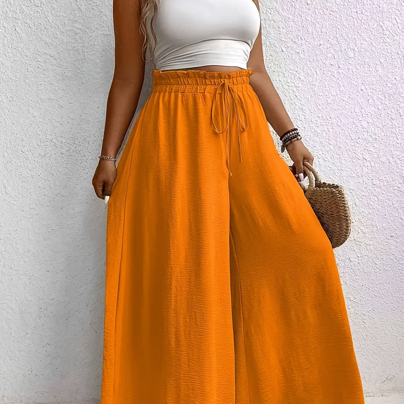 Chic mustard yellow wide-leg pants for women, perfect for commuting in style. Features decorative tie waist and lightweight polyester. Machine washable and perfect for relaxed outings.