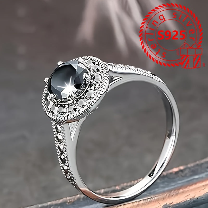 This stunning 925 sterling silver ring features a vintage-inspired design with a black cubic zirconia stone. Perfect for both casual wear and gifting, this ring comes with a gift box and weighs 2.9g. Ideal for ladies who appreciate timeless elegance.