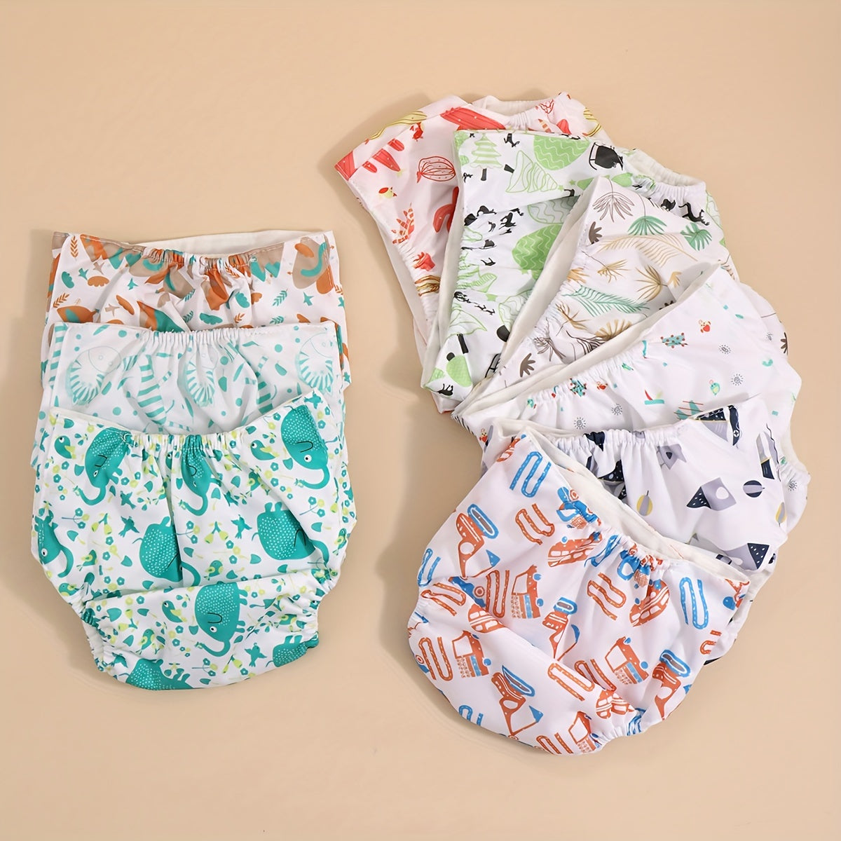 3-Pack of Baby and Toddler Training Pants - Waterproof Cotton Diaper Covers featuring Snaps, Printed Adjustable Cloth Diapers suitable for Newborns up to 3 Years Old, Absorbent and Reusable Nappy Pants