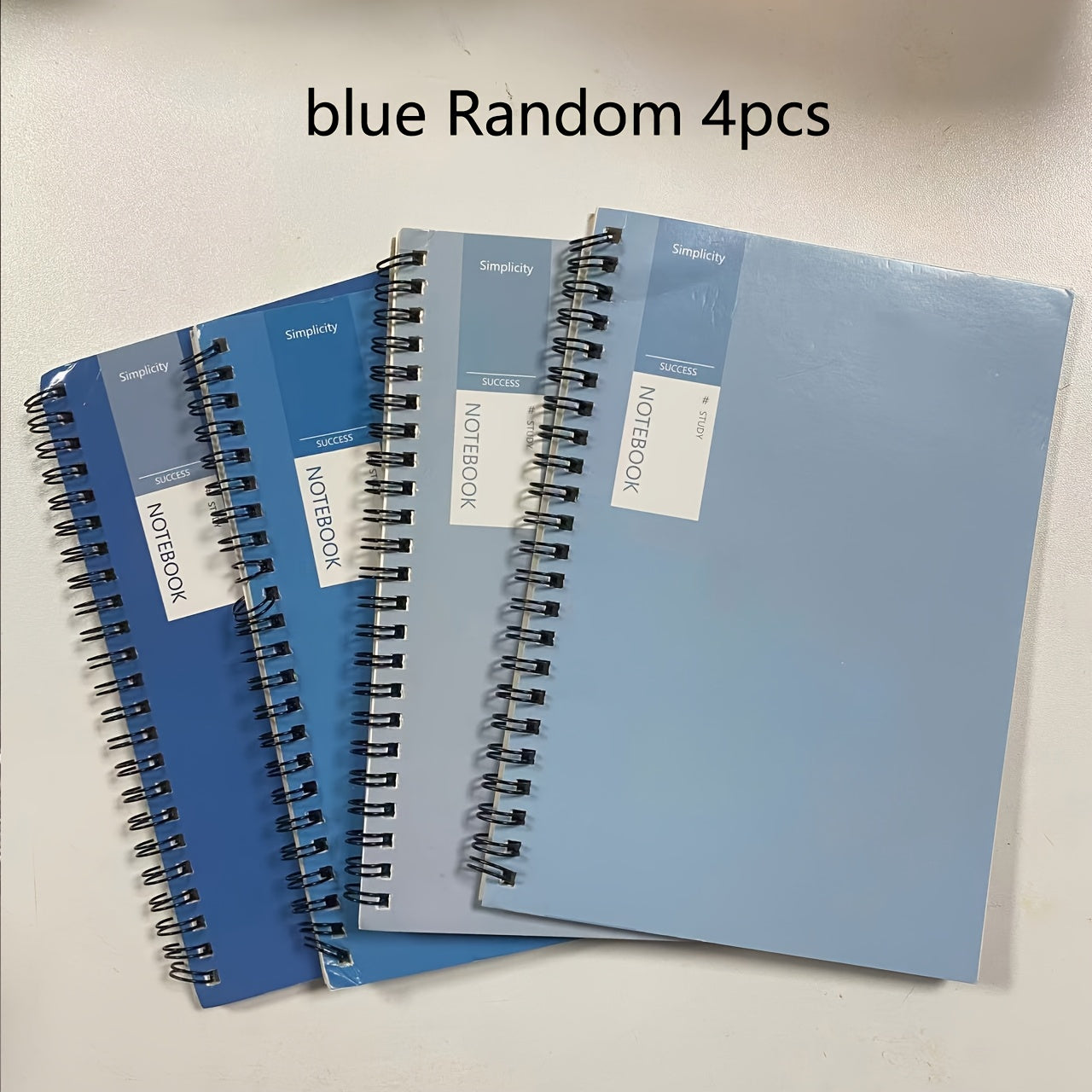 4-Pack of A5 Spiral Notebooks with Durable Softcover, Lined/Blank Pages, Twin-Wire Binding, Perfect for Students, Office, and Professionals.