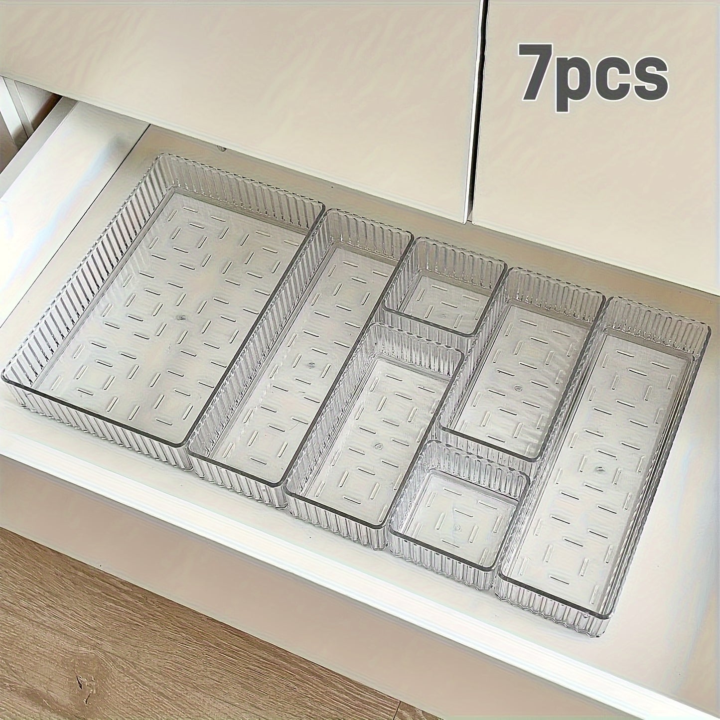 Clear plastic organizer set with customizable drawers for cosmetics and various storage needs, suitable for multiple spaces.