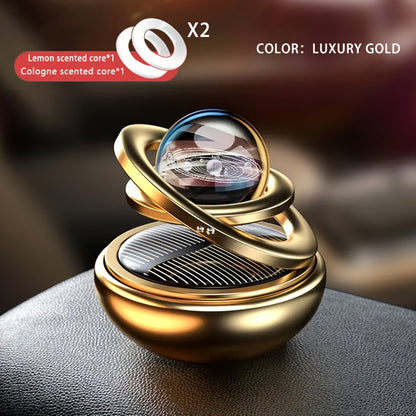 Solar rotating car aroma ornaments with solid perfume tablets for car interior decoration.