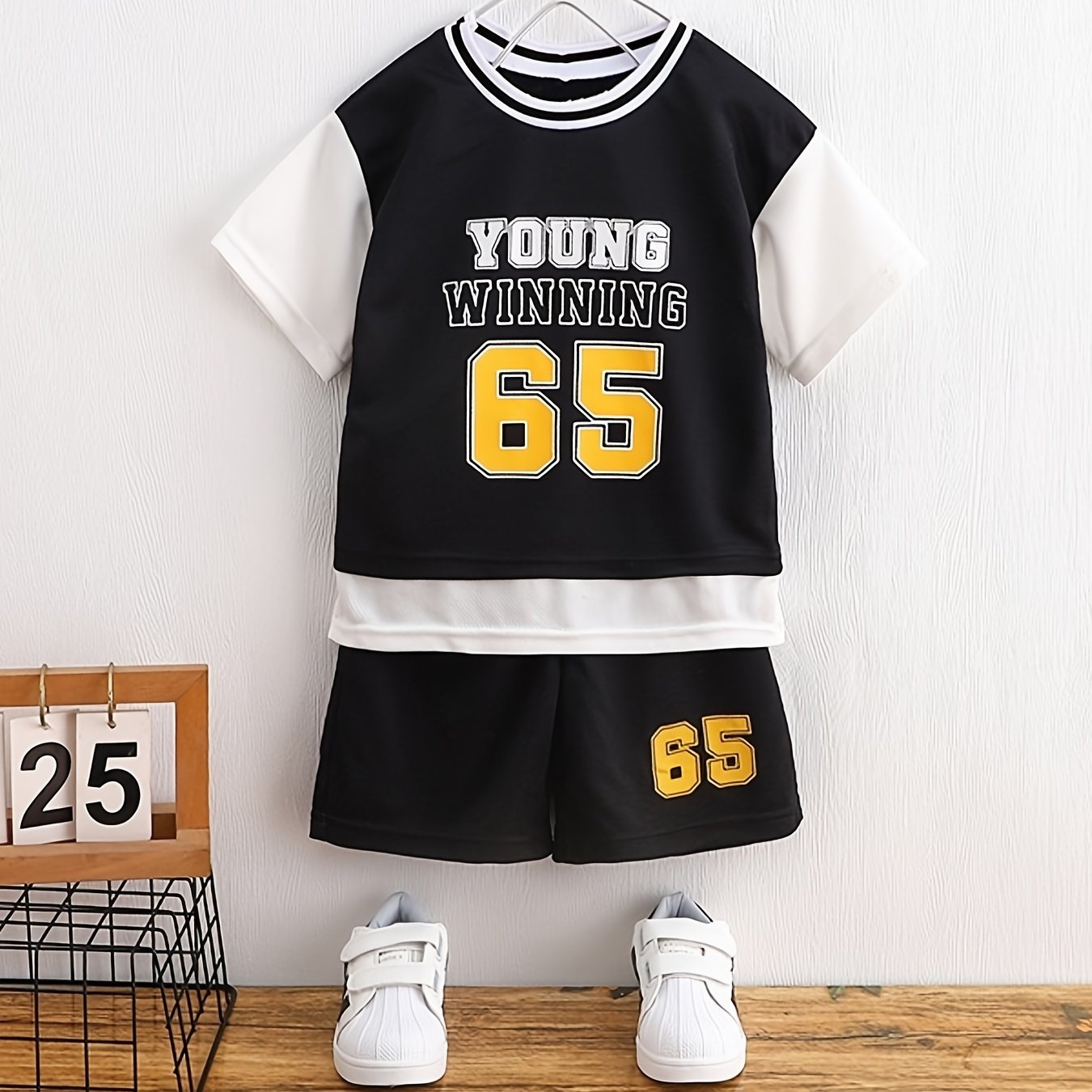 Boy's "Young Winning" casual outfit set includes a round neck t-shirt and shorts, perfect for daily and outdoor wear.