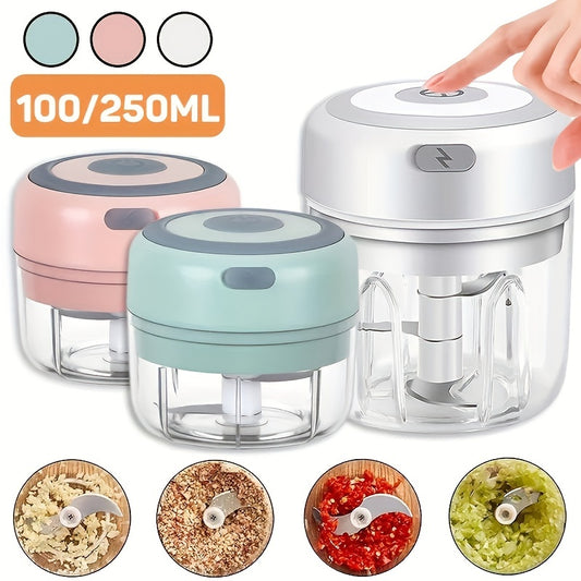 Compact electric mini food chopper with USB rechargeable battery, ideal for chopping garlic, vegetables, fruit, and meat.