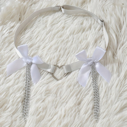 Stylish adjustable leg garter with white bow and heart charm. Perfect for weddings, dance, and costumes.