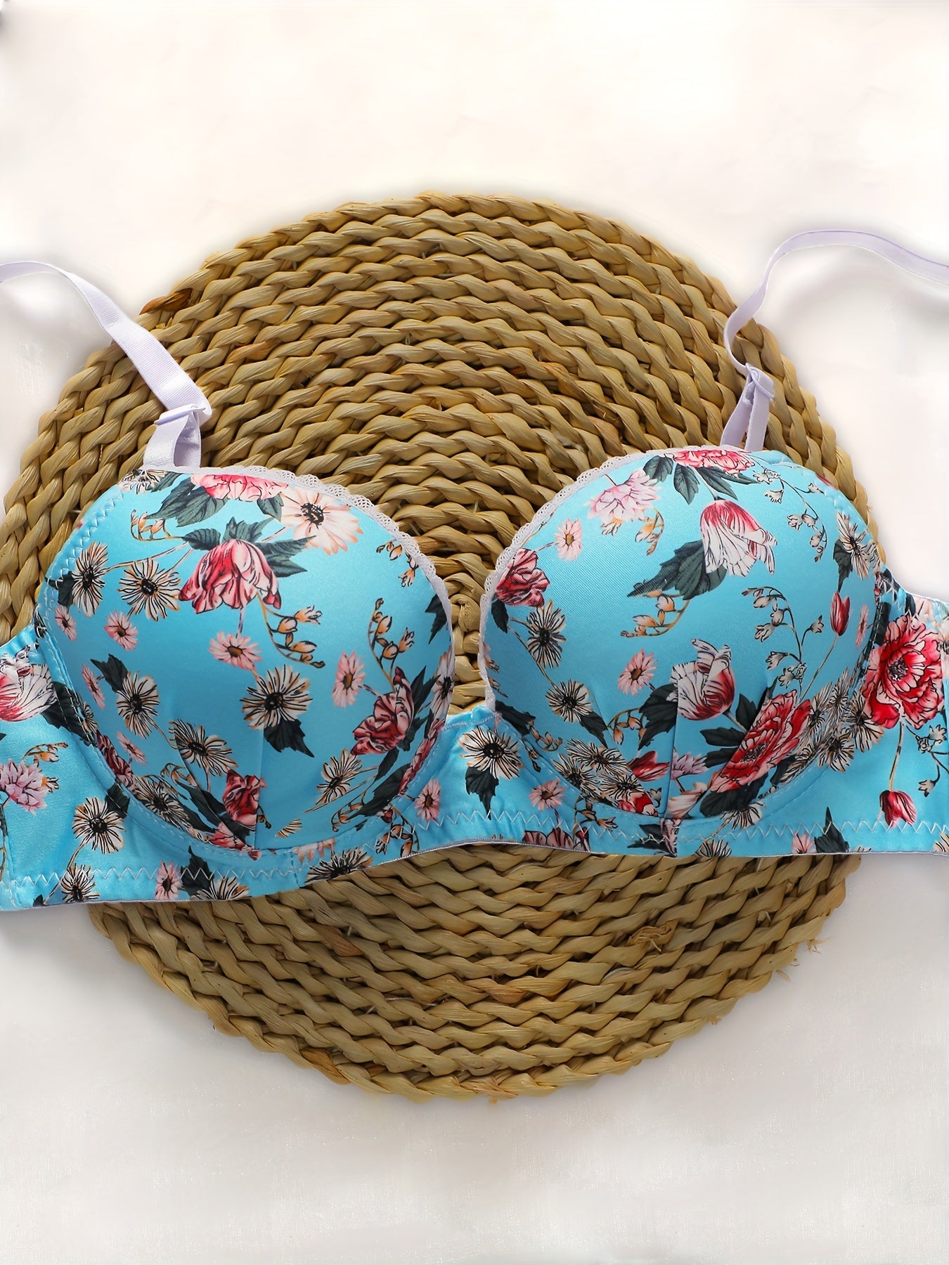 Blue floral lingerie set includes padded underwire bra and panty for a sexy summer look.