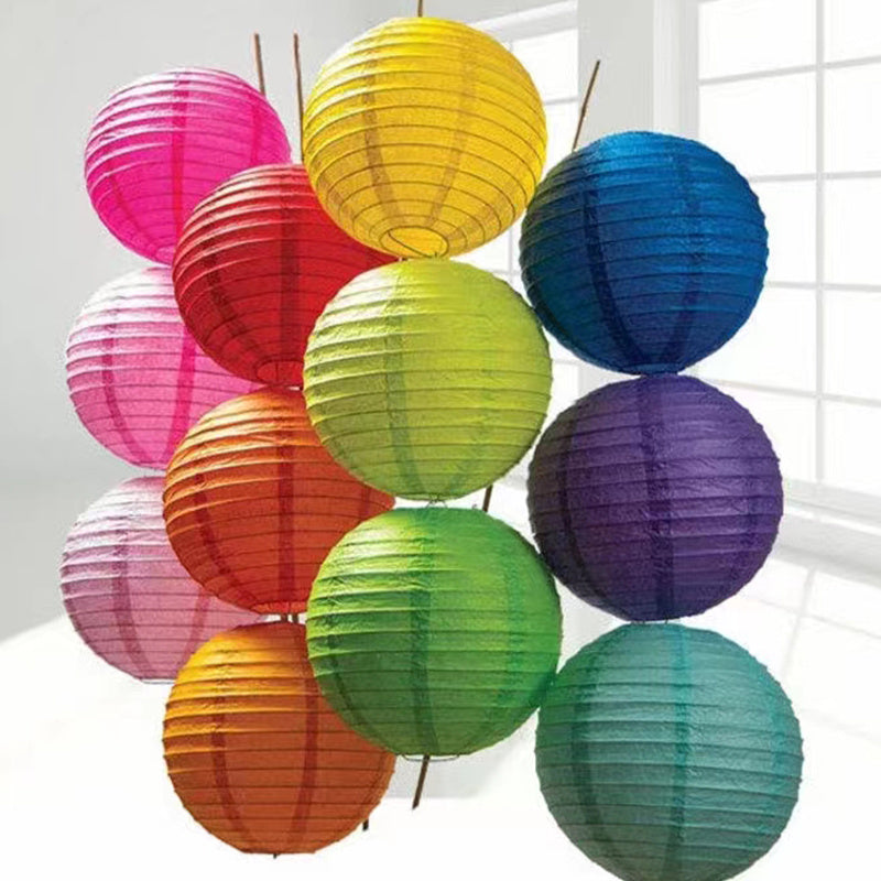 10 festive 7.9 inch paper lanterns in random colors for holidays and celebrations.