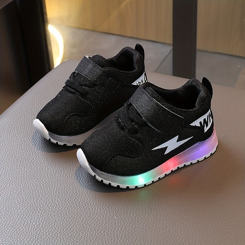 LED light-up sneakers for kids with breathable fabric and non-slip rubber sole, ideal for all seasons.