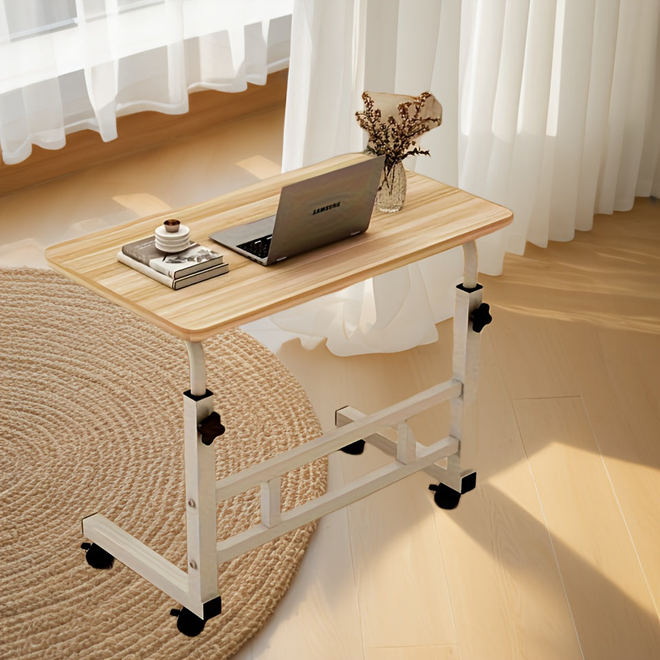 Rolling desk with adjustable height, space-saving metal frame. Ideal for home office and bedroom use. Available in ginger, white, black.