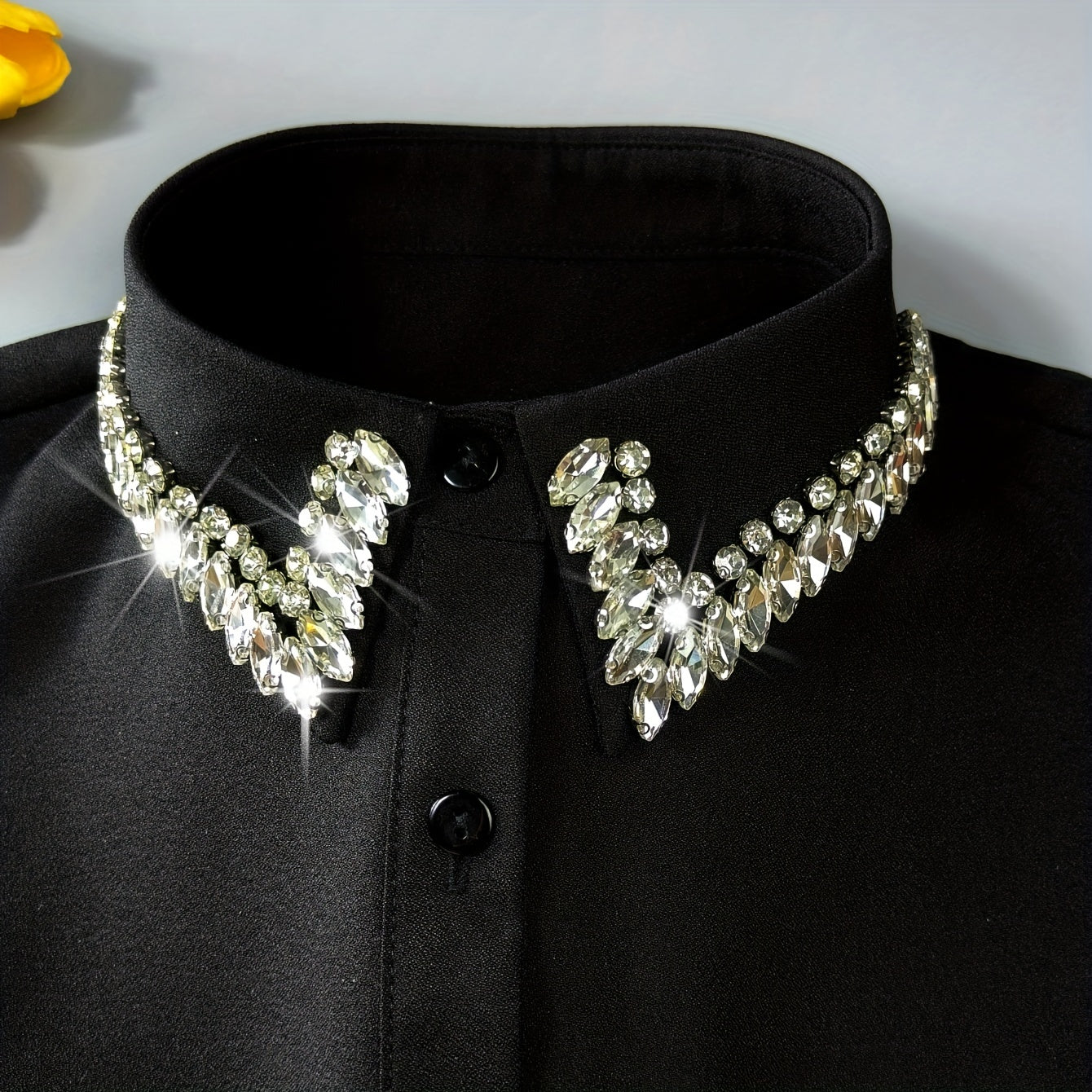 Luxurious sparkling rhinestone false collar for women made of 100% polyester. Elegant detachable half-shirt design that is machine washable. Versatile accessory for all seasons.