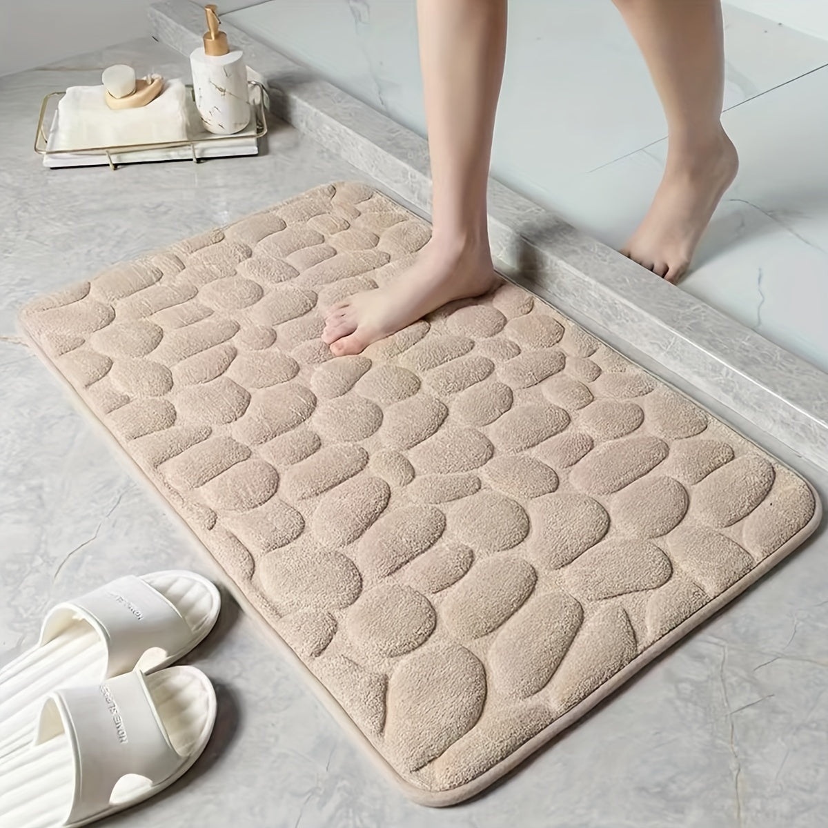 Pamper Your Feet with our Luxurious 3D Pebble Design Bath Rug! This Quick-Dry Non-Slip Bathroom Mat is made of Soft and Comfortable Polyester Memory Foam. It is Woven with a density of 700gsm and is 1.5cm Thick. Perfect for Home Decor and as Holiday