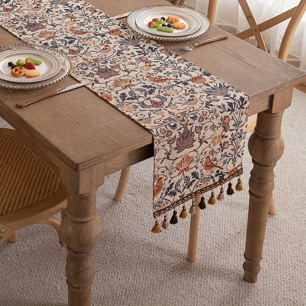 Vintage floral and bird jacquard table runner with tassels in rustic countryside style. Made of polyester, 33cm wide. Ideal for dining, coffee, and tea tables. Vintage design with polyester fabric.