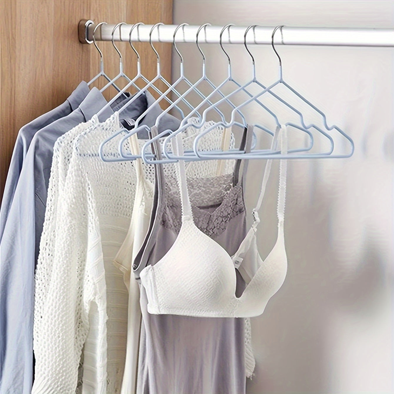 Essential for any home wardrobe, these durable non-slip metal hangers come in a convenient 10-pack. Featuring shoulder grooves to keep clothing in place, these space-saving hangers are perfect for hanging tops and dresses.