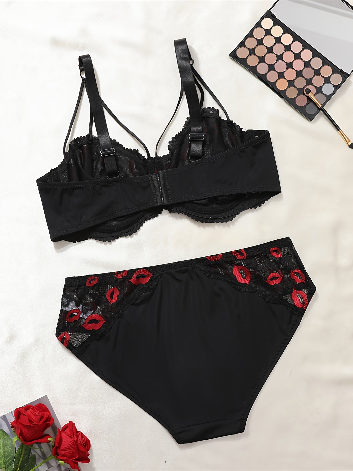 Sexy plus size lace lingerie set with kiss lips embroidery, unlined bra, and mid-waist panty for women.