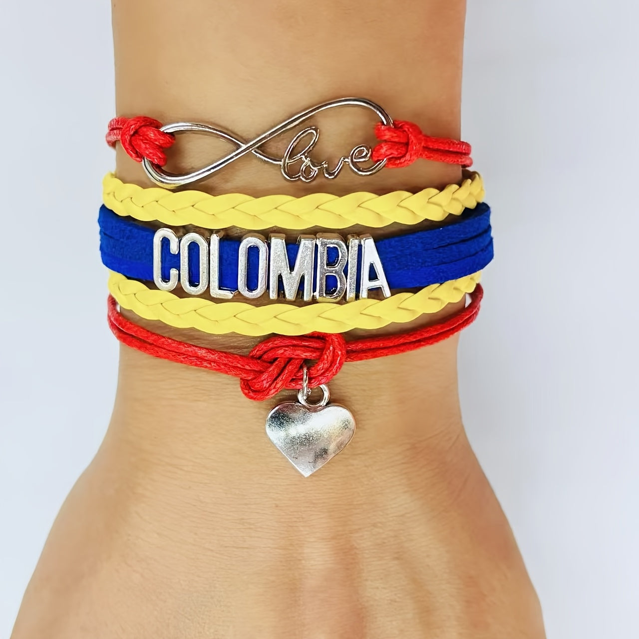 Elegant and passionate Colombia Love Weaving Bracelet made of Colombia alloy with a beautiful love logo design.