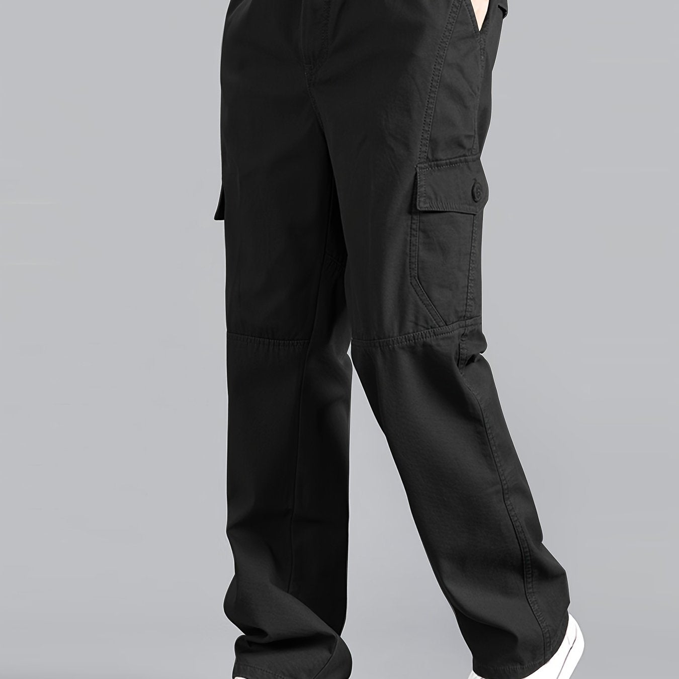 Casual cotton cargo pants for men, with solid color, multi-pocket design, loose fit, and non-stretch woven fabric. Ideal for daily wear in the Spring/Fall Collection.