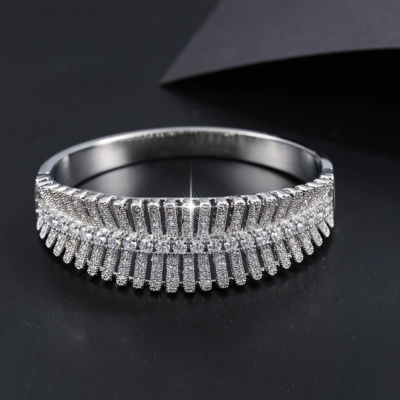 An elegant and stylish zirconia-encrusted bracelet with a chic hollow design