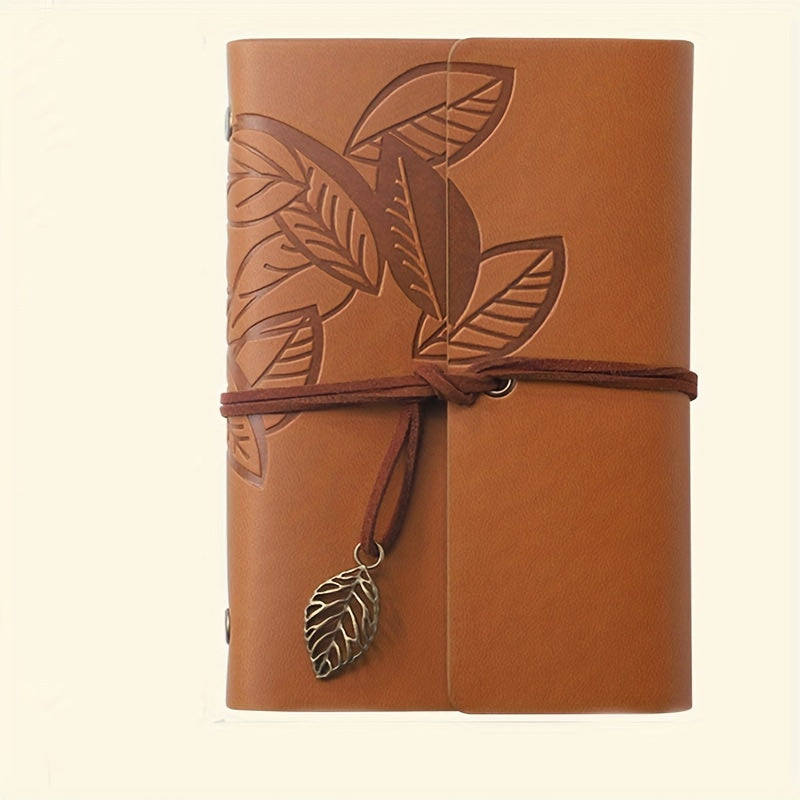 Vintage spiral-bound faux leather notebook with leaf-embossed design and strap closure, available in black, orange, and blue, perfect for students and travelers.