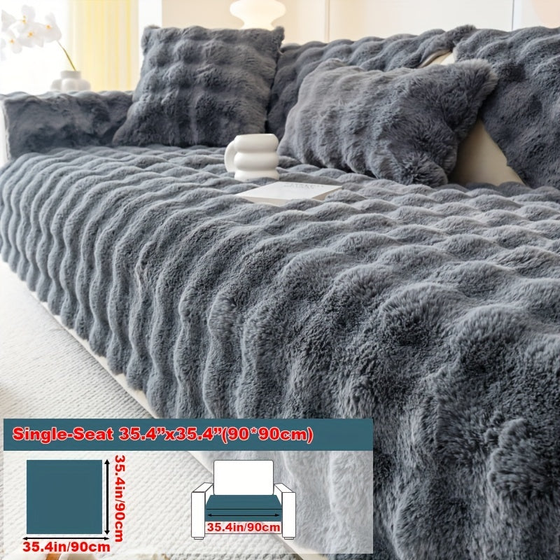 Faux rabbit fur sofa cover for cozy winter warmth. Pet-friendly, machine washable. Fits single to four-seater sofas. Perfect for living room, bedroom, office decor.