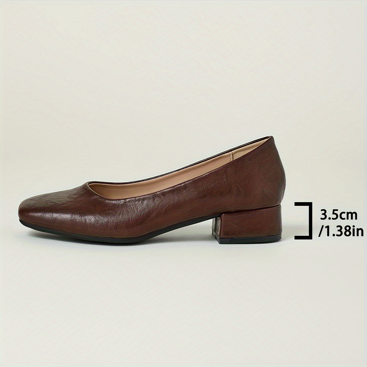 Stylish square-toe pumps with mid-heel and rubber sole.