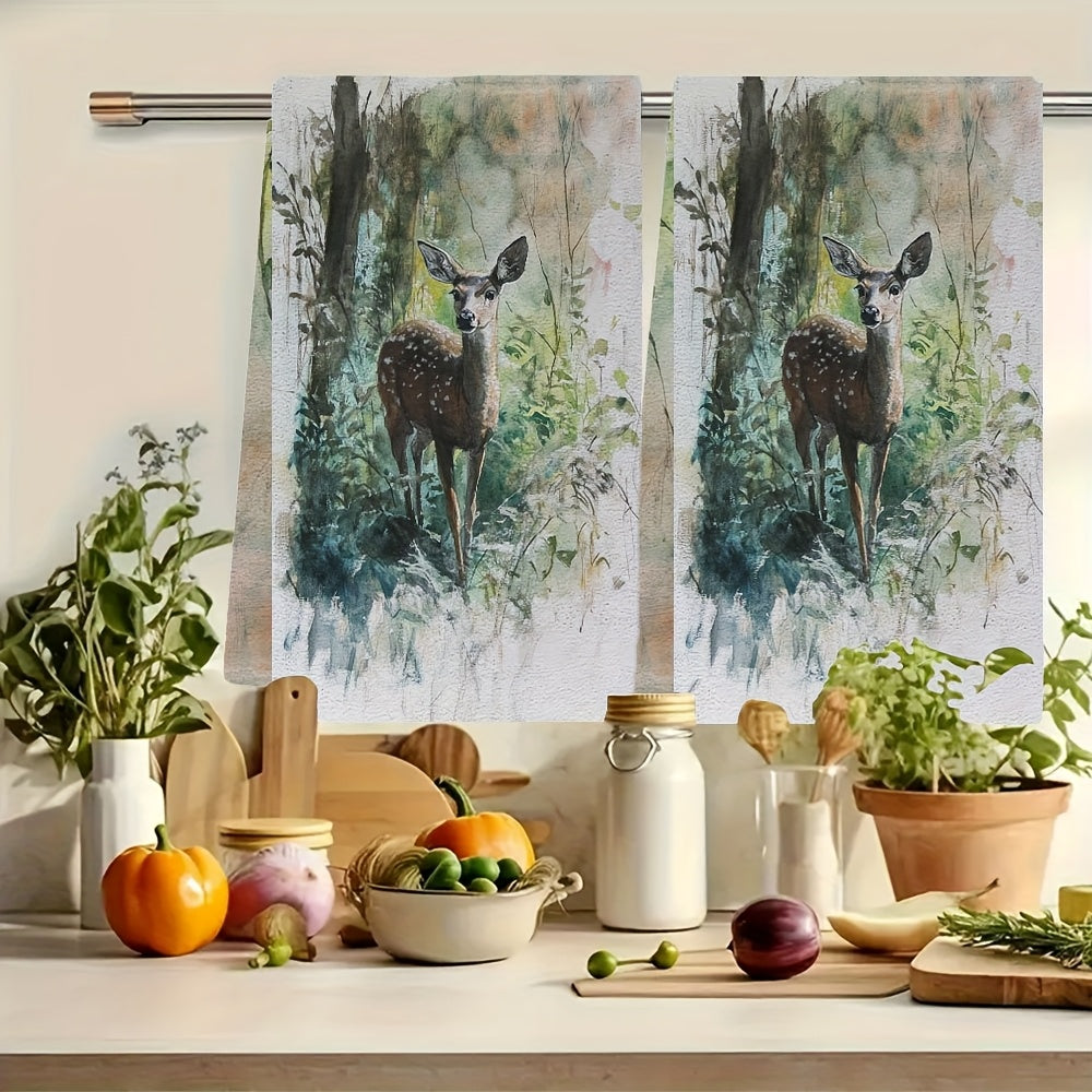 Two pieces of ultra soft kitchen towels featuring a graceful deer in underbrush design. These highly absorbent and machine washable dish hand towels are designed in a contemporary watercolor style, measuring 40.64x60.96 cm. Perfect for holiday decor and