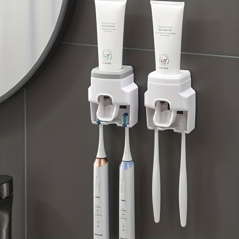 Wall mounted toothbrush holder and toothpaste dispenser with automatic squeezer, ideal for family washroom.