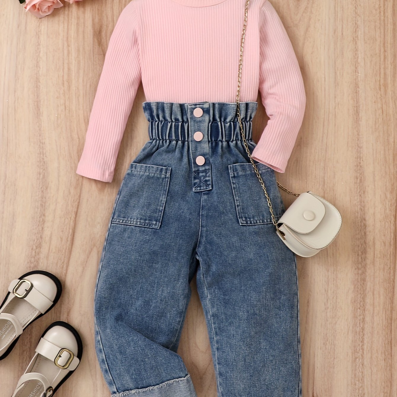 Girl's cotton denim pantsuit includes denim pants and a striped cotton long sleeve top.