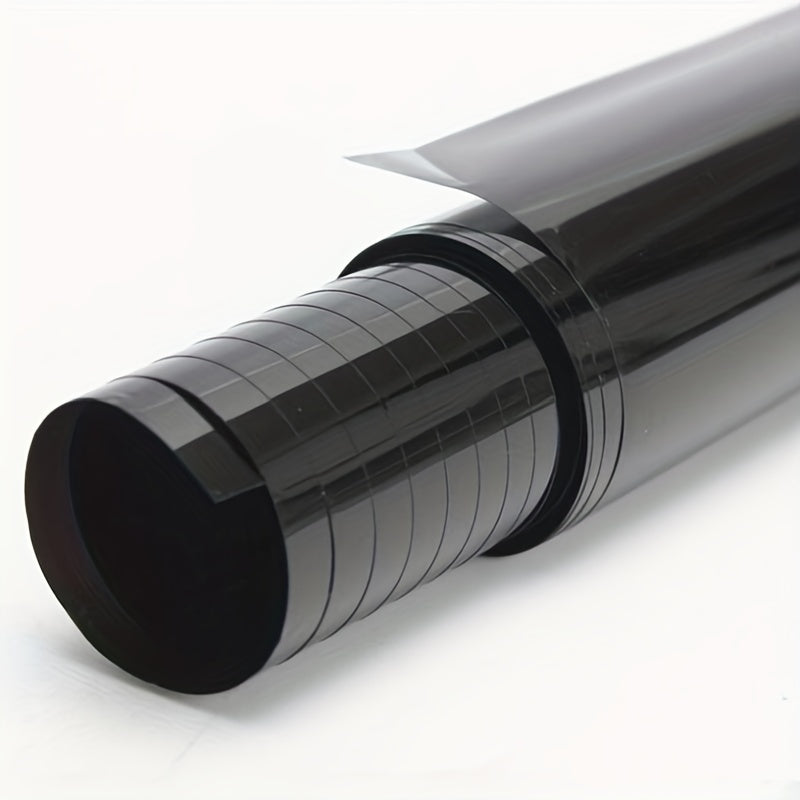 Black car window tint film roll for UV protection, measuring 300cmx50cm/118.11inx19.69in, suitable for both cars and homes.