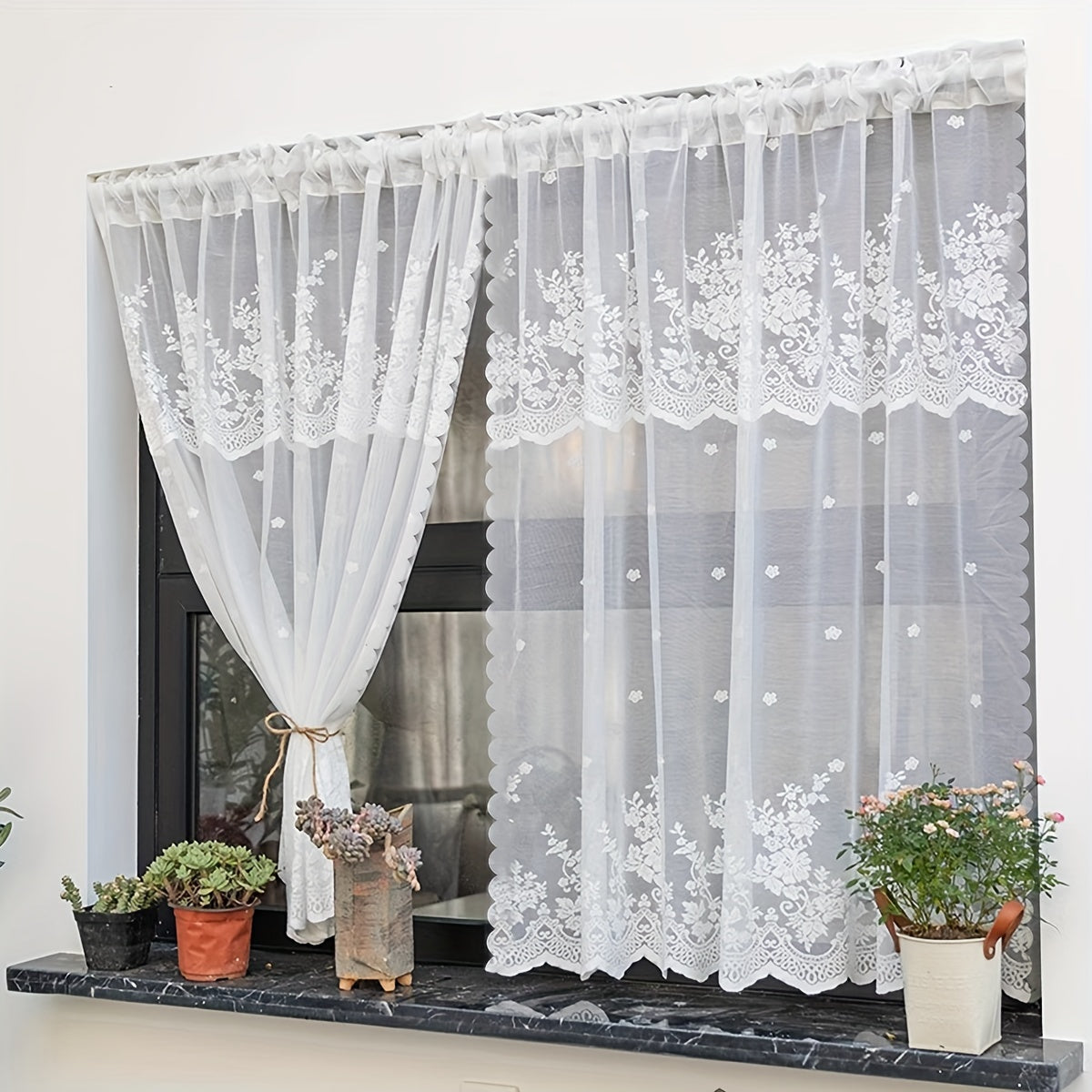 Add a touch of charm to your living space with this lovely White Floral Lace Curtain featuring a Sweet Garden Style. The Rod Pocket Design makes hanging a breeze, making it perfect for windows and doors in the living room, bedroom, or kitchen. Made of