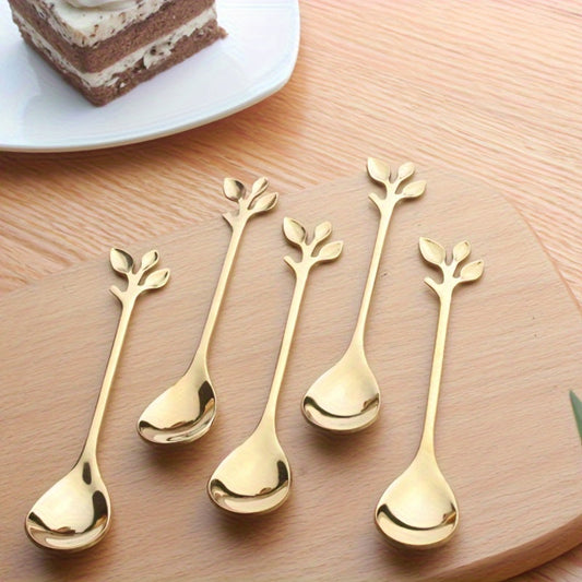 Set of 10 stainless steel coffee spoons with creative leaf-shaped handles, perfect for stirring coffee or desserts. Also includes honey and fruit spoons. Each spoon measures 12.4cm and is available in both silvery and golden colors. Choose from a set of