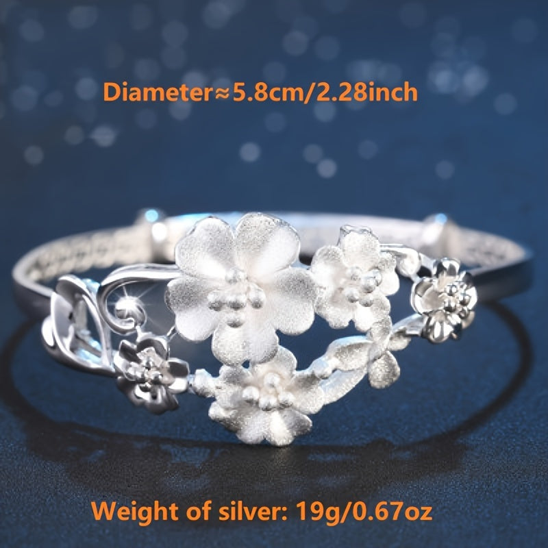 Sterling Silver Flower Bracelet made from S999 silver, features an adjustable design that is both fashionable and versatile. This noble fashion bracelet is a perfect gift for lovers, mothers, daughters, and as party, Valentine's Day, or Christmas gifts.