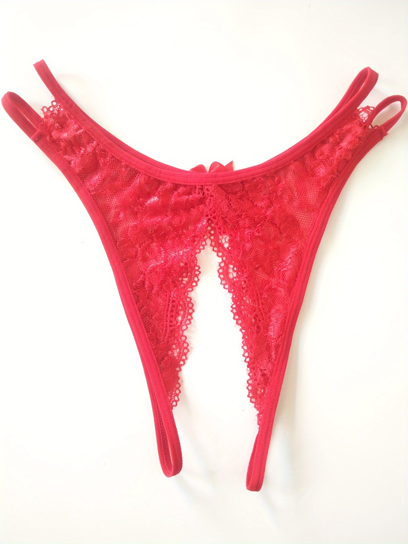 Floral lace thong with open crotch and bow detail - Women's lingerie.