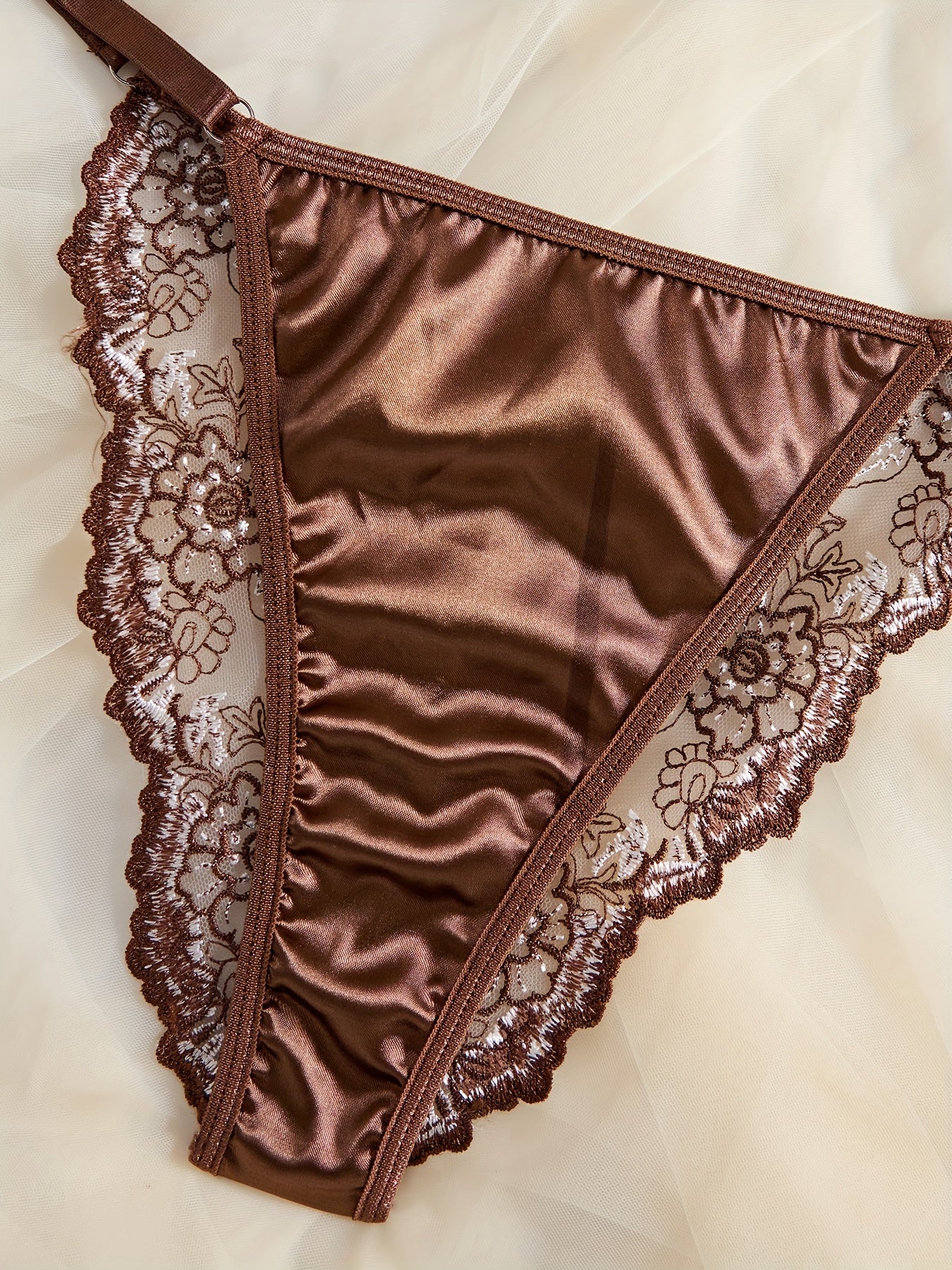 Floral embroidered satin lingerie set including plunge bra and thong, for sexy women's underwear.