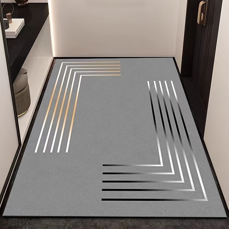 Soft and absorbent diatomaceous earth mat with elegant gray and golden stripe design. Ideal for kitchens, bathrooms, and entrances. Features a durable rubber backing that is non-slip. Hand wash only for easy cleaning. Luxurious and quick-drying.