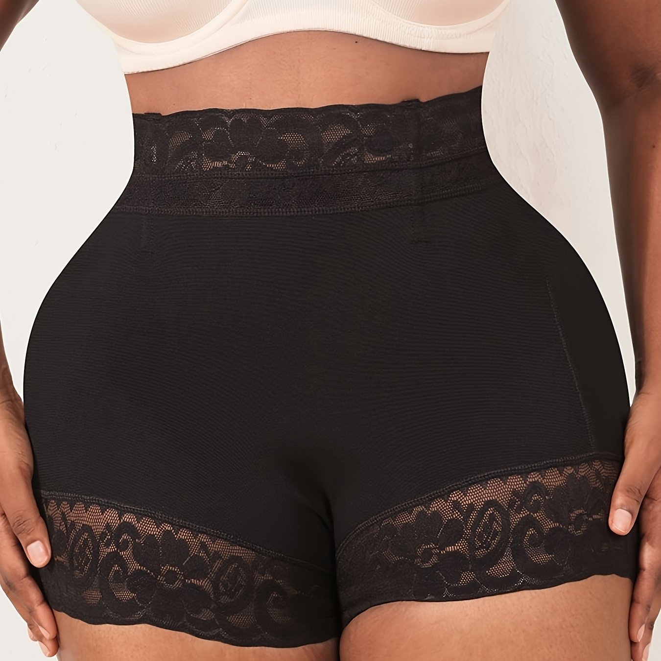 Shapewear shorts with lace trim for comfortable tummy control and butt lifting.